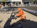 Manual block splitter in use on an outdoor paving project