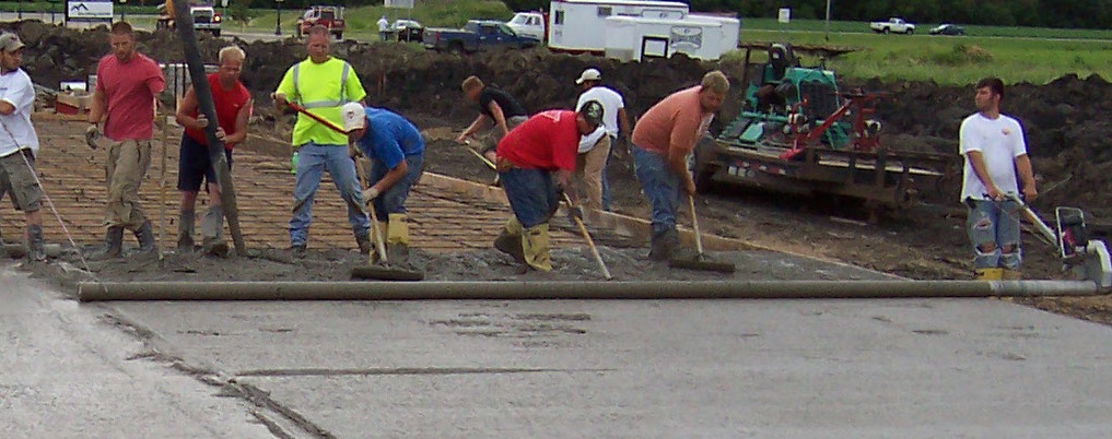 Flat, even screeded floor with a smooth light grey surface over the structural concrete