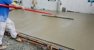Rough structural concrete slab showing coarse aggregate and unfinished surface texture